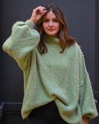 Pull col haut vert