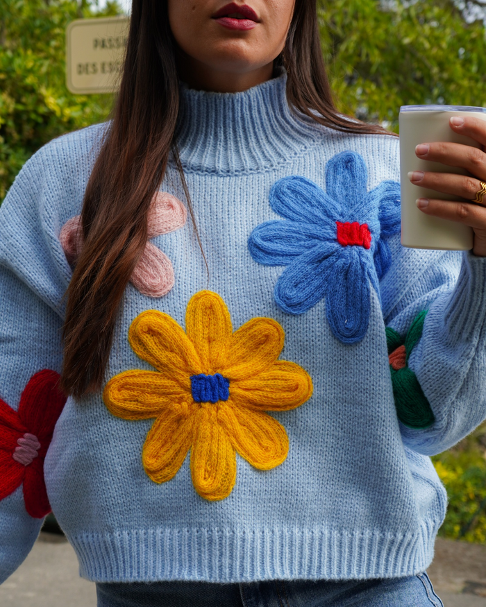 Pull fleurs bleu