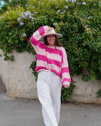 Pull rayures rose défectueux