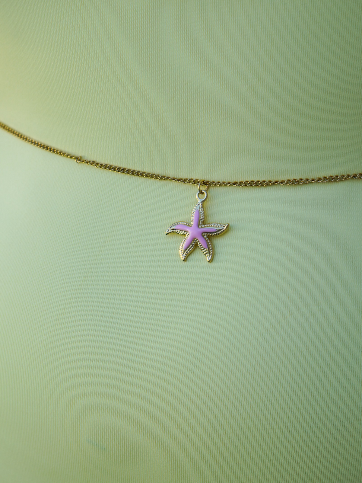 Chaîne de taille étoile rose