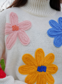 Pull fleurs colorées